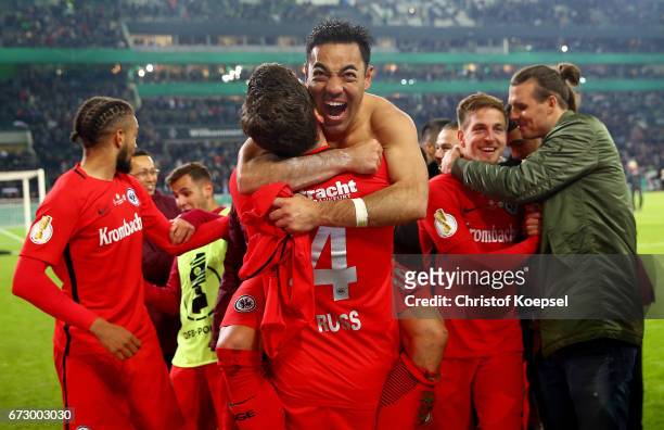 Fabian of Frankfurt celebrate with his team mates victory after penalty shoot out during the DFB Cup semi final match between Borussia...