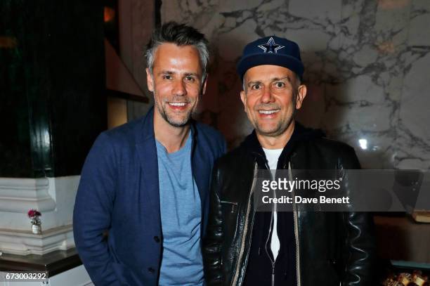 Richard Bacon and Marc Quinn attend a pre-opening dinner hosted by Kate Bryan at Zobler's Delicatessen at The Ned London on April 25, 2017 in London,...