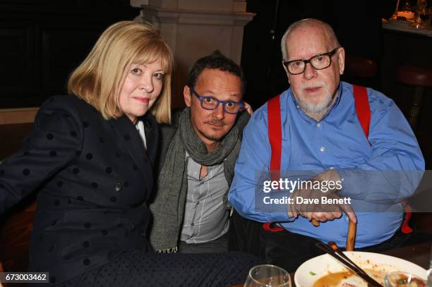 Chrissie Blake, Jonathan Yeo and Sir Peter Blake attend a pre-opening dinner hosted by Kate Bryan at Zobler's Delicatessen at The Ned London on April...