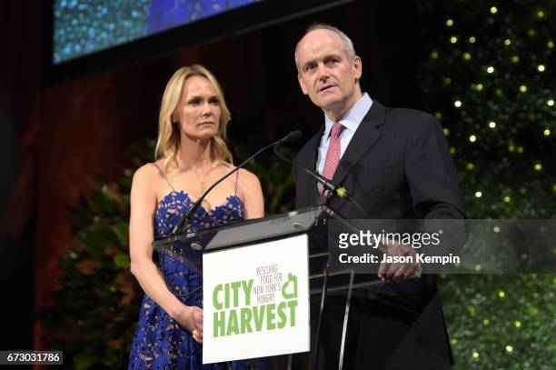 Honorees Lise and Michael Evans accept an award onstage at City Harvest's 23rd Annual Evening Of Practical Magic at Cipriani 42nd Street on April 25,...