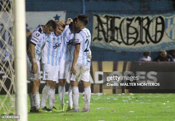 Argentinian Atletico Tucuman player David Barbona celebrates with teammates after scoring against Bolivian Wilstermann, during their Libertadores Cup...
