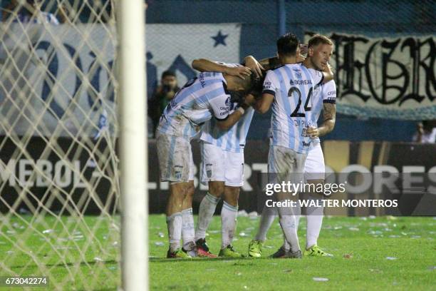Argentinian Atletico Tucuman player David Barbona celebrates with teammates after scoring against Bolivian Wilstermann, during their Libertadores Cup...