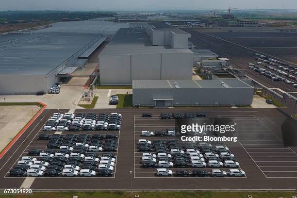 Mitsubishi Motors Corp. Vehicles sit in a parking lot at the company's plant in Cikarang, Indonesia, on Tuesday, April 25, 2017. Mitsubishi Motors...