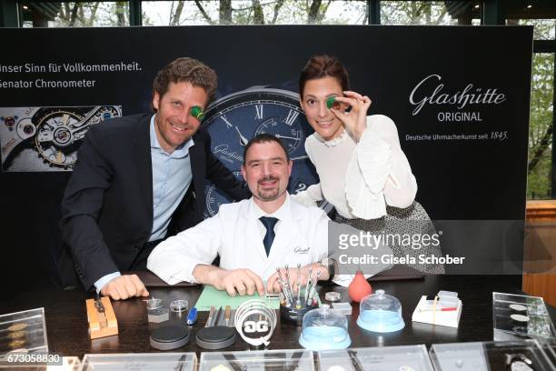 Philip Greffenius, Edition Sportiva, and his wife Evelyn Greffenius with a watchmaker during the piano night hosted by Wempe and Glashuette Original...