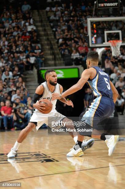 Patty Mills of the San Antonio Spurs handles the ball against the Memphis Grizzlies during Game Five of the Western Conference Quarterfinals of the...