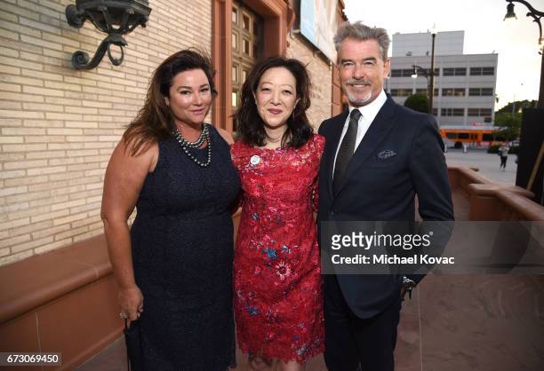 Journalist Keely Shaye Smith, President of NRDC Rhea Suh, and actor Pierce Brosnan attend NRDC STAND UP! for the planet 2017 on April 25, 2017 in...