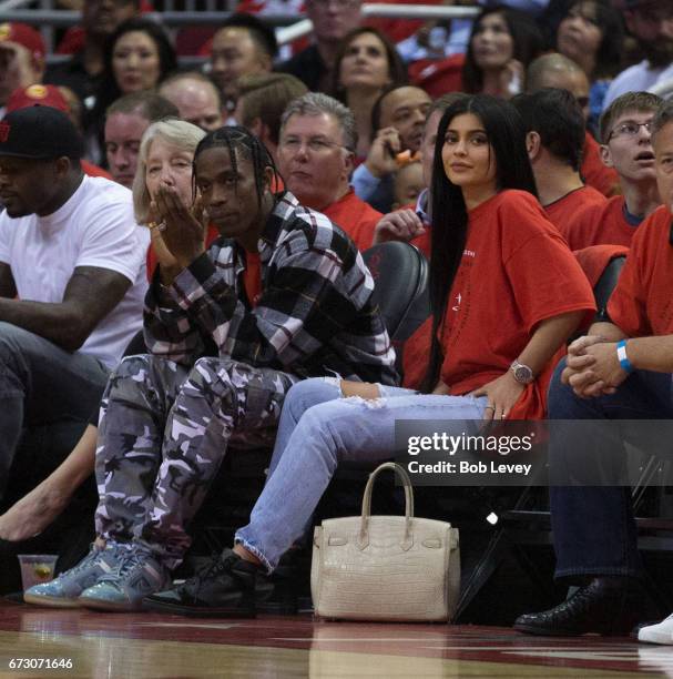 Houston rapper Travis Scott and Kylie Jenner watch courtside during Game Five of the Western Conference Quarterfinals game of the 2017 NBA Playoffs...