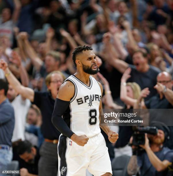 Patty Mills of the San Antonio Spurs reacts after a three against the Memphis Grizzlies in Game Five of the Western Conference Quarterfinals during...