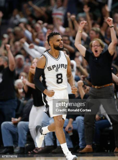 Patty Mills of the San Antonio Spurs reacts after a three against the Memphis Grizzlies in Game Five of the Western Conference Quarterfinals during...