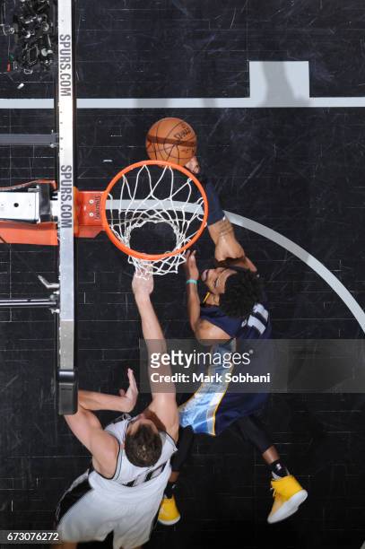 Mike Conley of the Memphis Grizzlies shoots the ball against the San Antonio Spurs during Game Five of the Western Conference Quarterfinals of the...