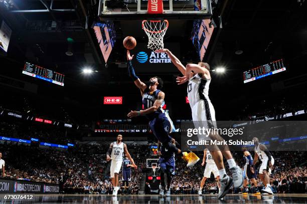 Mike Conley of the Memphis Grizzlies shoots the ball against the San Antonio Spurs during Game Five of the Western Conference Quarterfinals of the...