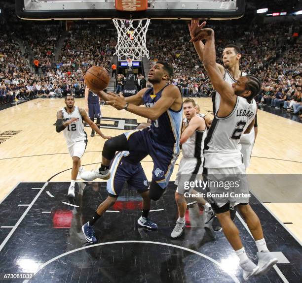 Andrew Harrison of the Memphis Grizzlies drives past Kawhi Leonard of the San Antonio Spurs in Game Five of the Western Conference Quarterfinals...