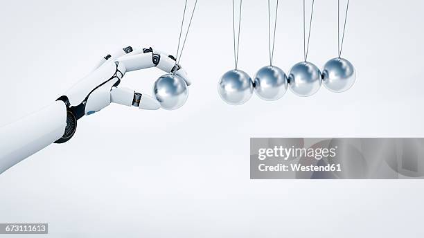 bildbanksillustrationer, clip art samt tecknat material och ikoner med robot's hand pushing newton's cradle, 3d rendering - skrivbordsprydnad