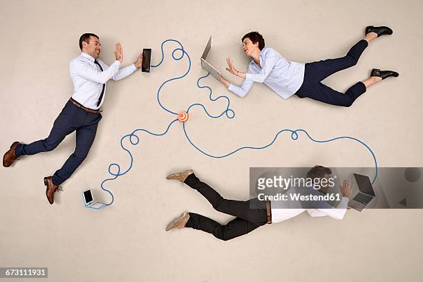 three business colleagues being connected via devices, waving - hovering fotografías e imágenes de stock