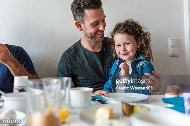 father and daughter having breakfast together - breakfast fathers imagens e fotografias de stock