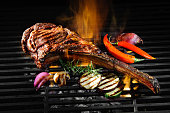 Tomahawk rib beef steak on grill