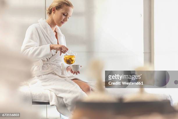 young woman in spa having tea - premium tea bildbanksfoton och bilder