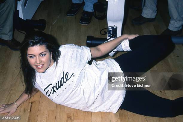 Alicia Machado, Miss Universe 1996, exercises with fitness expert Edward Jackowski at the Exude Fitness Center to work off excess pounds gained since...