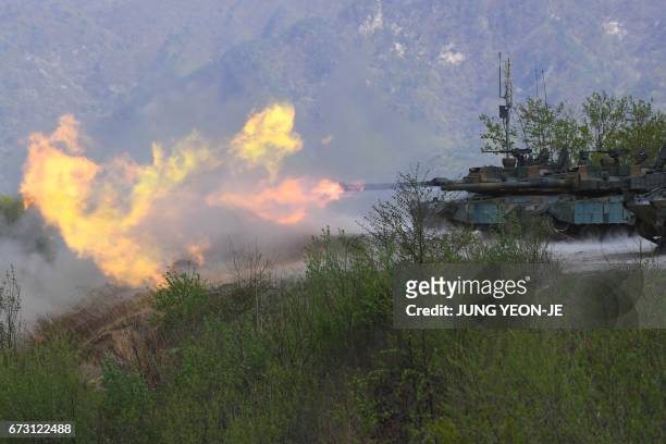 South Korean K2 tanks fire live rounds during a joint live firing drill between South Korea and the US at the Seungjin Fire Training Field in...
