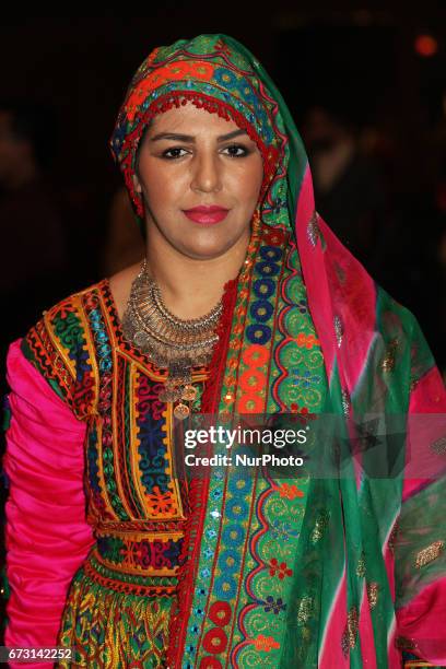 Woman from Afghanistan dressed in a traditional outfit during Nevruz celebrations in Toronto, Canada. Nevruz which means 'new day' marks the first...