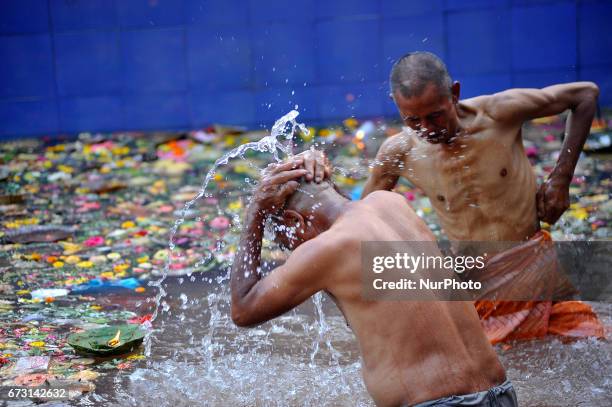 Devotees taking ritual holy bath during the Mother's Day to perform puja at Matatritha temple in Kathmandu, Nepal on Wednesday, April 26, 2017....