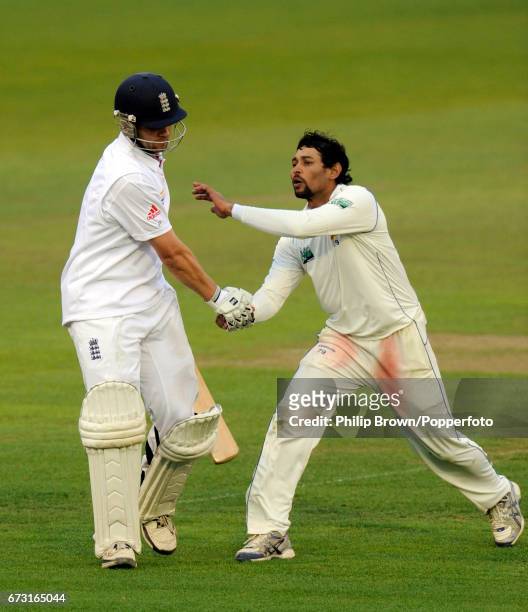 Jonathan Trott of England is congratulated by Tillakaratne Dilshan of Srt Lanka after Trott was dismissed for 203 during the 1st Test match at the...