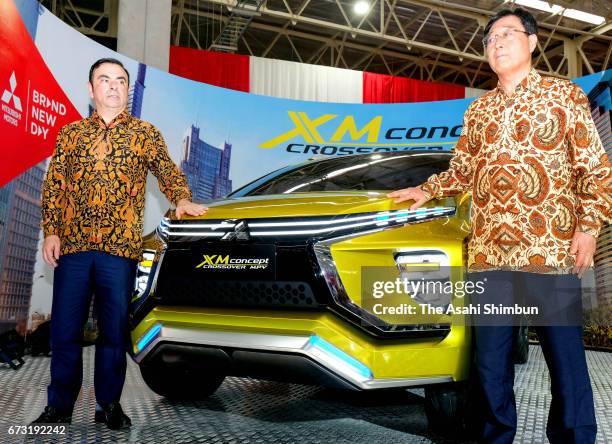 Mitsubishi Motors Chairman Carlos Ghosn and President Osamu Masuko attend the opening ceremony of the new plant on April 25, 2017 in Bekasi,...