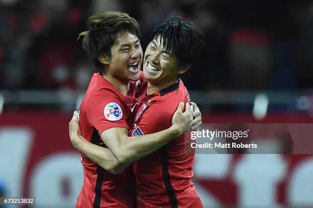 Takahiro Sekine of Urawa Red Diamonds celebrates scoring a goal with Yuki Muto of Urawa Red Diamonds during the AFC Champions League Group F match...