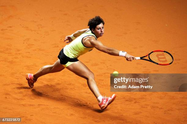 Carlo Suarez Navarro of Spain in action during her match against Tamara Korpatsch of Germany during the Porsche Tennis Grand Prix at Porsche Arena on...