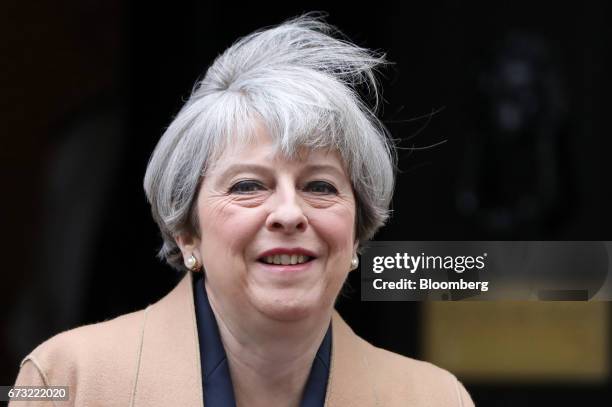 Theresa May, U.K. Prime minster, leaves 10 Downing Street to attend the parliament's weekly question and answer session in London U.K., on Wednesday,...