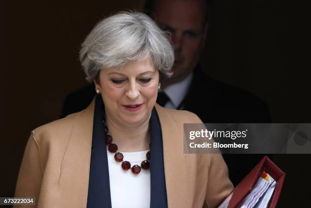 Theresa May, U.K. Prime minster, leaves 10 Downing Street to attend the parliament's weekly question and answer session in London U.K., on Wednesday,...