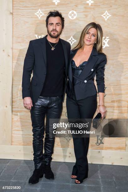 At the evening gala for the new collection Masters of louis Vuitton by Jeff Koons, Justin Theroux with his wife Jennifer Aniston pose for Paris Match...