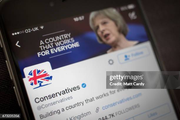 This photo illustration shows the Twitter page for the Conservative Party on an iPhone on April 26, 2017 in Bristol, England. The use of digital...