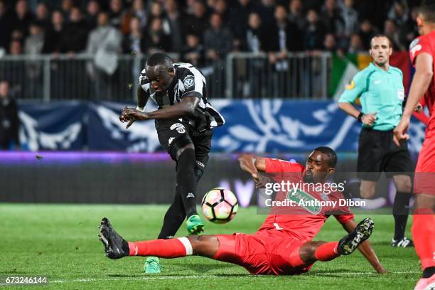 Famara Diedhiou of Angers and Moustapha Diallo Elhadji of Guingamp during the Semi final of the French Cup match between Angers and Guingamp at Stade...