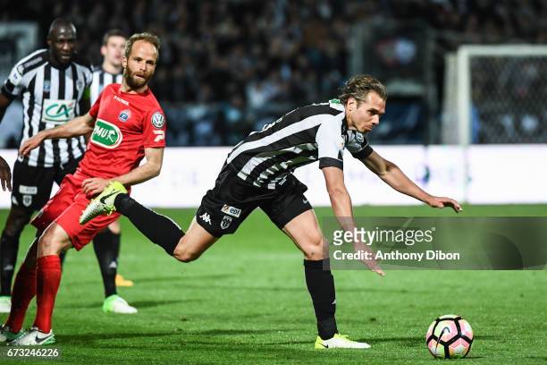 Etienne Didot of Guingamp and Kevin Berigaud of Angers during the Semi final of the French Cup match between Angers and Guingamp at Stade Jean Bouin...