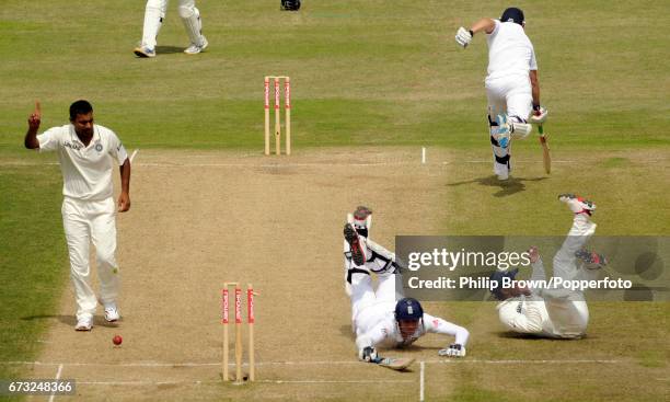 England batsman Stuart Broad is run out by India's substitute fielder Wriddhiman Saha as Praveen Kumar reacts during the 2nd Test match against India...