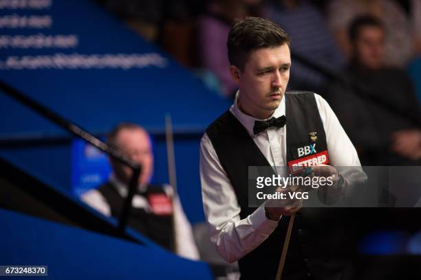Kyren Wilson of England reacts during his quarter-finals match against John Higgins of Scotland on day twelve of Betfred World Championship 2017 at...