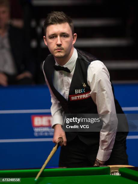 Kyren Wilson of England reacts during his quarter-finals match against John Higgins of Scotland on day twelve of Betfred World Championship 2017 at...