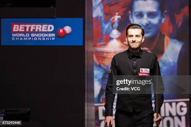 Mark Selby of England reacts during his quarter-finals match against Marco Fu of Chinese Hong Kong on day twelve of Betfred World Championship 2017...