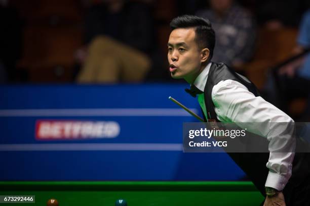 Marco Fu of Chinese Hong Kong reacts during his quarter-finals match against Mark Selby of England on day twelve of Betfred World Championship 2017...