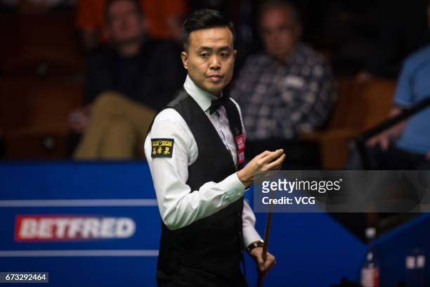 Marco Fu of Chinese Hong Kong reacts during his quarter-finals match against Mark Selby of England on day twelve of Betfred World Championship 2017...
