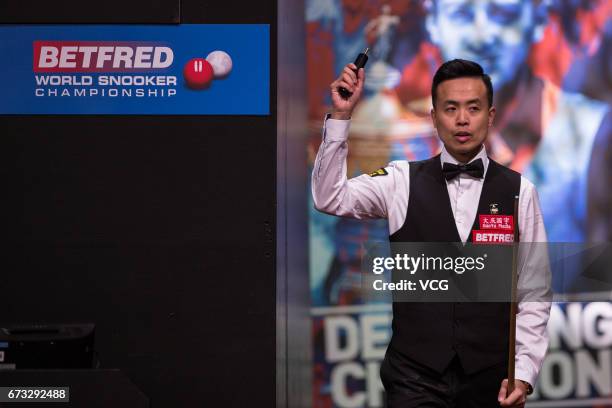 Marco Fu of Chinese Hong Kong reacts during his quarter-finals match against Mark Selby of England on day twelve of Betfred World Championship 2017...