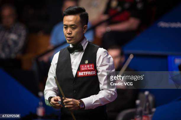 Marco Fu of Chinese Hong Kong reacts during his quarter-finals match against Mark Selby of England on day twelve of Betfred World Championship 2017...