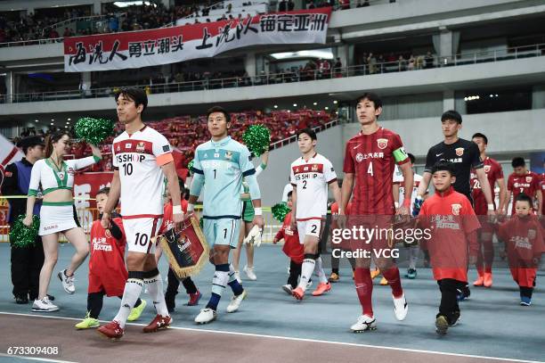 Players walk into the field prior to 2017 AFC Champions League group match between Shanghai SIPG F.C. And F.C. Seoul at Shanghai Stadium on April 26,...