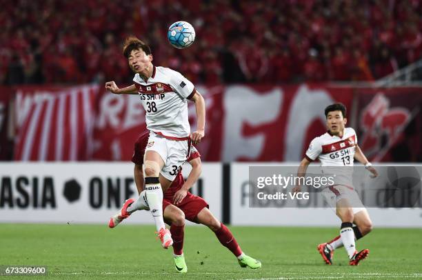 Kim Kun-hoan of FC Seoul heads the ball during 2017 AFC Champions League group match between Shanghai SIPG F.C. And F.C. Seoul at Shanghai Stadium on...