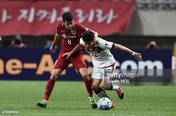 Oscar of Shanghai SIPG and Go Yo-han of FC Seoul vie for the ball during 2017 AFC Champions League group match between Shanghai SIPG F.C. And F.C....