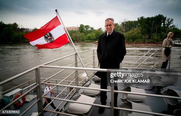 Austrian President Alexander Van der Bellen enjoys his view of the river Danube near Bratislava, Slovakia onboard the Twin City Liner river ship on...