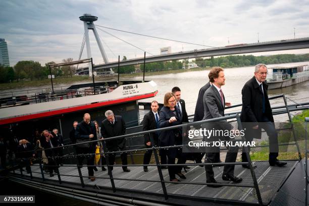 Austrian President Alexander Van der Bellen gets off the Twin City Liner river ship on the river Danube in Bratislava, Slovakia, on April 26, 2017....