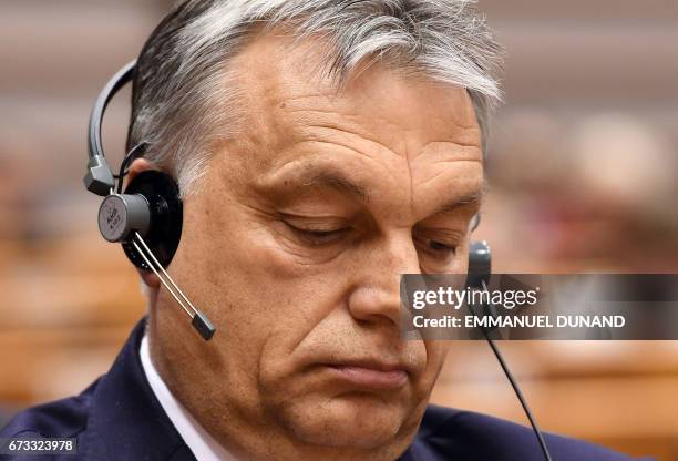 Hungary's Prime Minister Viktor Orban takes part in a planery session at the European Parliament on the situation in Hungary, in Brussels on Avril...