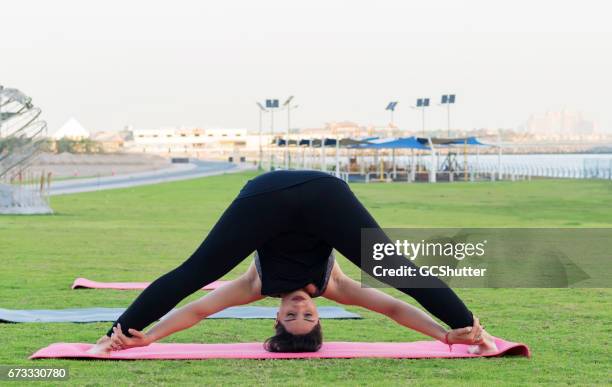 yoga is not just about flexibility, its about willingness - atlantis stock pictures, royalty-free photos & images